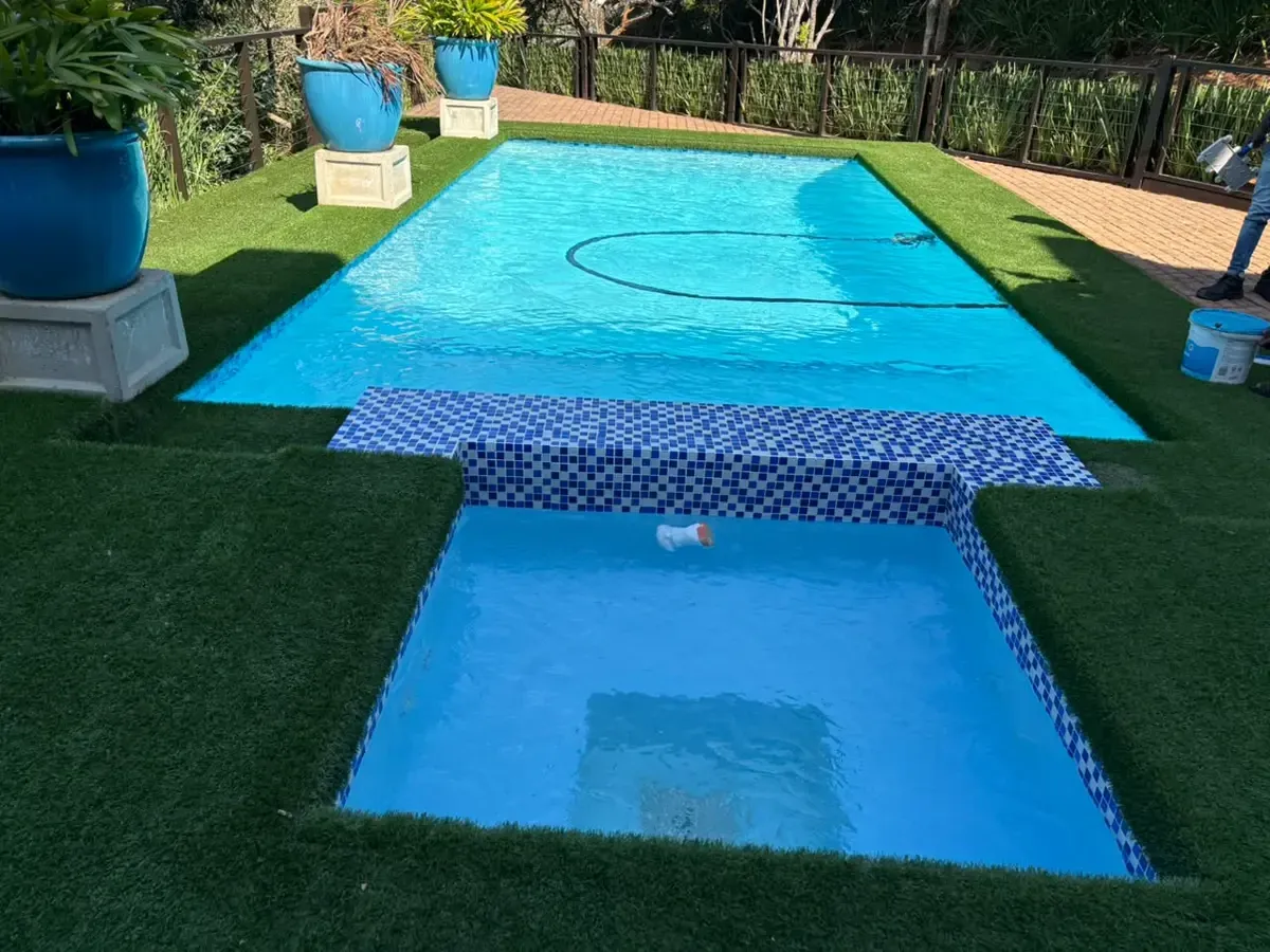 Blue swimming pool cleaned and maintained by Walters Pool